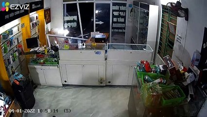 Motorcyclist Loses Control and Crashes into Store Window