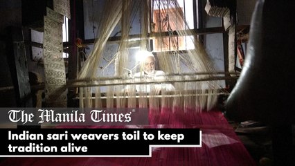 Indian sari weavers toil to keep tradition alive