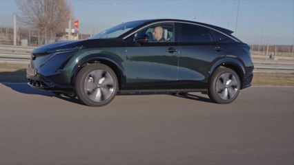 Nissan Ariya in Aurora Green Slalom driving