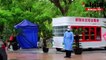 سكان شنغهاي يصطفون تحت المطر لإجراء فحوص كوفيد-19