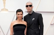 Kim Kardashian reveals sister Kourtney and Travis Barker 'definitely want to see what life would be like with a baby'