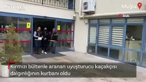 Kırmızı bültenle aranan uyuşturucu kaçakçısı, dalgınlığının kurbanı oldu