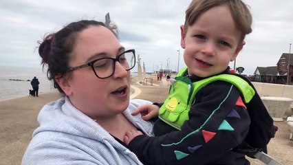 Two year old Oscar Peachy walks a mile in memory of dad