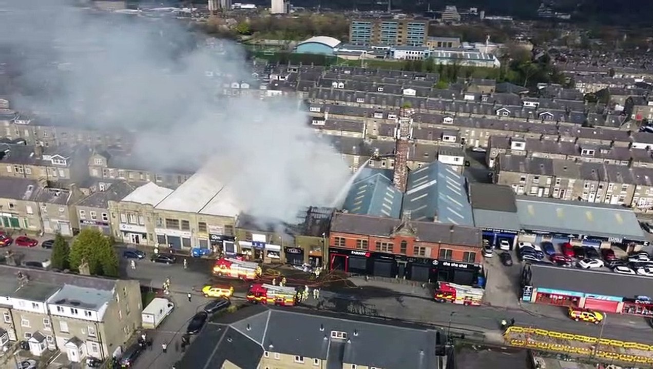 Watch AV8  Aerial Media's drone footage of fire on Queens Road in Halifax on April 15, 2022