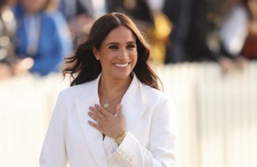 Meghan Markle Wore a White Double-Breasted Blazer With Nothing Underneath