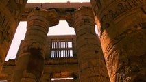 Hieroglyphs and various symbols at pillars inside Karnak Temple in Luxor, Egypt.