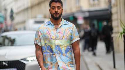 Voici - PHOTO Slimane papa : rare et adorable cliché de sa fille, qui barbote dans une piscine