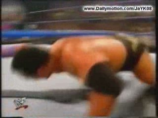 the rock destroys kurt angle and 2 referees