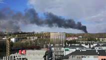 Thick black smoke fills the sky in Lviv following reports of multiple Russian strikes on the city