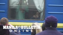 Heartfelt goodbyes as evacuation train leaves Ukraine's Zaporizhzhia