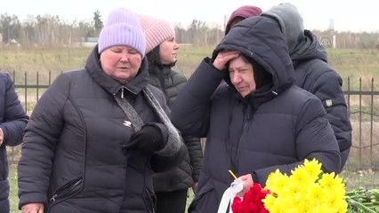 Kilisenin bahçesinden çıkarılan cesetler Buça'daki mezarlığa defnediliyor