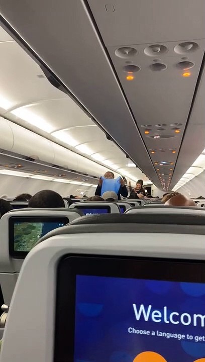 Jetblue Flight Attendant Singing "Throw Away Your Masks"