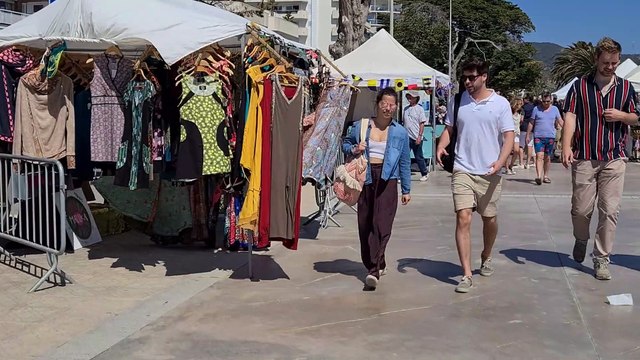 Beach Walk Tour: People SunBathing in Sitges Busy Beach
