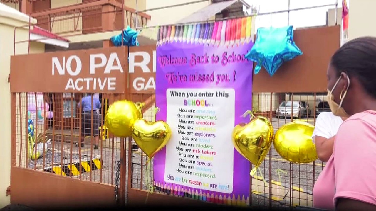 SMILES, TEARS AND PROTESTS AS SCHOOLS REOPEN