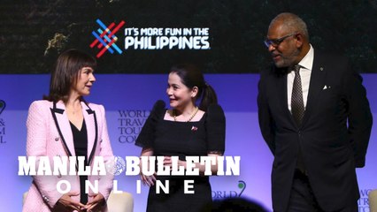 Tourism Sec. Bernadette Romulo-Puyat talks to the media during the opening and press conference of the WTTC
