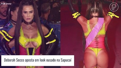 Deborah Secco curte Carnaval na Sapucaí com look cavado de látex e chicote