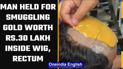 Download Video: Man held at Delhi airport for sumggling gold worth Rs 30 lakh inside his wig and rectum | OneIndia