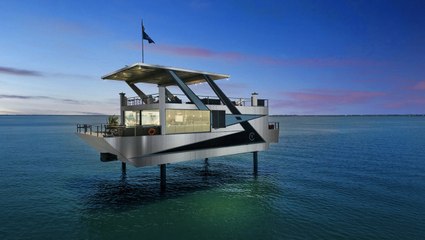 This Floating Yacht Villa in Florida Has a Rooftop Deck, Hot Tub, and Panoramic Glass Walls