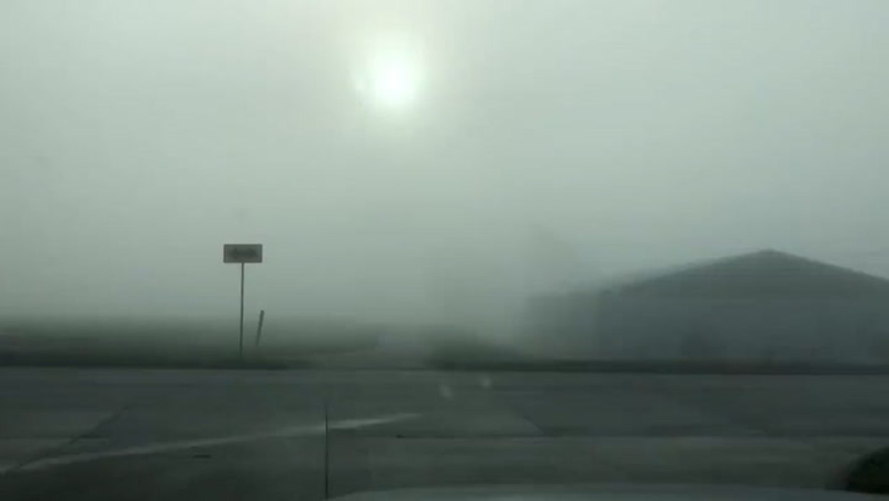 Thick fog envelopes an Iowa town