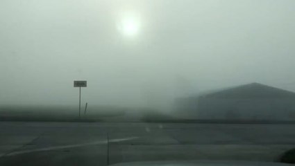 Thick fog envelopes an Iowa town