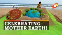 World Earth Day: Sand Artist Creates Sculpture With A Message