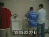 Guy Gets Caught Peeking While Peeing