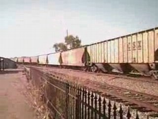 SD40-2s Gliding around curve with grain train