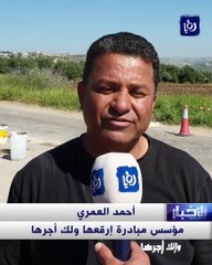 "ارقعها ولك أجرها"..  مبادرة لطمر وإصلاح حفر الشوارع بالأسمنت في اربد