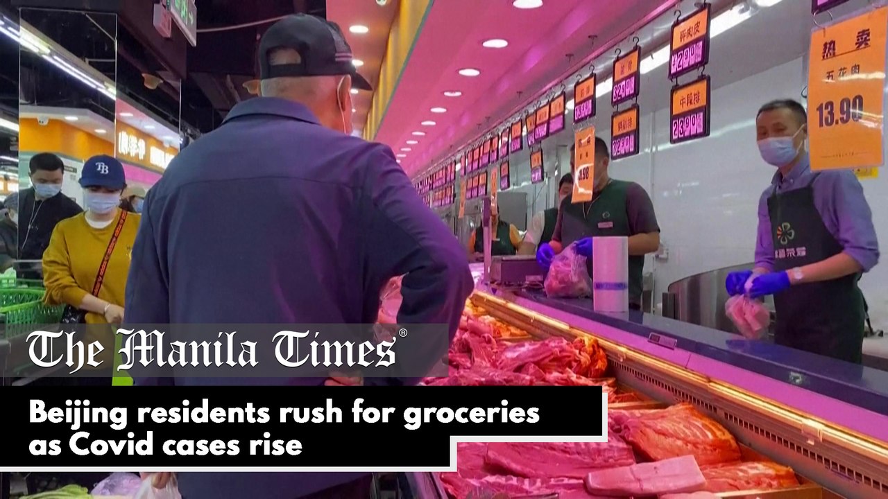 Beijing residents rush for groceries as Covid cases rise