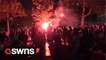 Paris police fire tear gas and charge protesters furious at Macron’s re-election