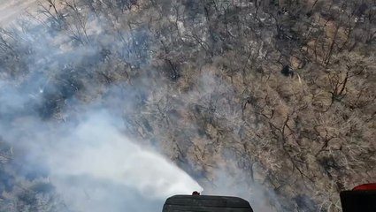 Helicopter drops water onto Nebraska wildfire
