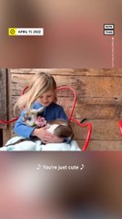 Little Girl Sings Original Lullaby to Baby Goat