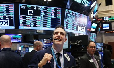 مؤشر داو جونز يحطم كل الأرقام السابقة ويغلق فوق 34 ألف نقطة