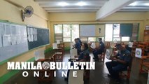 Police Officers in Central Visayas cast their votes for the local absentee voting