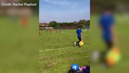 A boy from Snodland scores a goal and celebrates with his mum