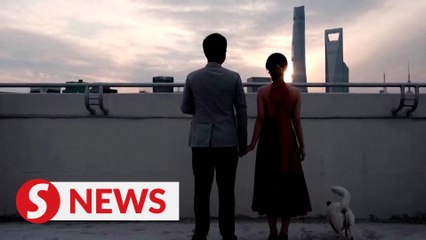 Shanghai couple mark would-be wedding with photos