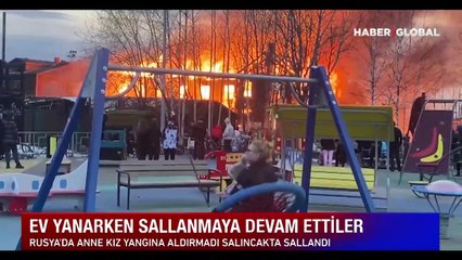 Yangına aldırış etmediler: Ev yanarken sallanmaya devam ettiler!