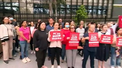 Staff protest ahead of Dominic Perrottet school visit