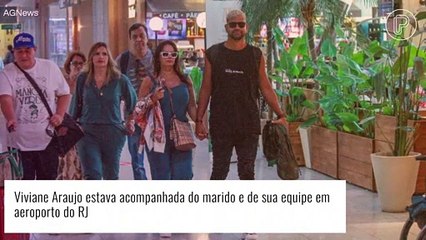 Grávida, Viviane Araujo aposta em look comfy para viagem com marido. Saiba destino da atriz!
