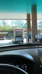 Police Car Drives Off With Gas Pump