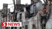 Russia pounds Ukraine as some civilians escape Mariupol