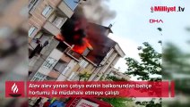 Esenyurt'ta alev alev yanan çatıya bahçe hortumu ile yardım etmeye çalıştı