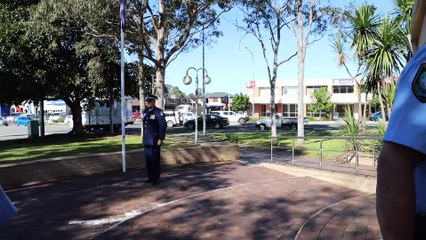 Senior Constable Mark Dawes receives a guard of honour