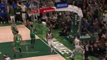 Giannis shimmies after assisting Holiday lay-up