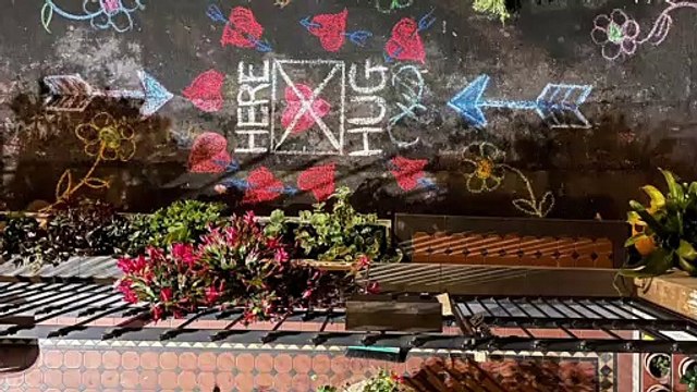Hug Here Chalk Art Creates Heartwarming Moments