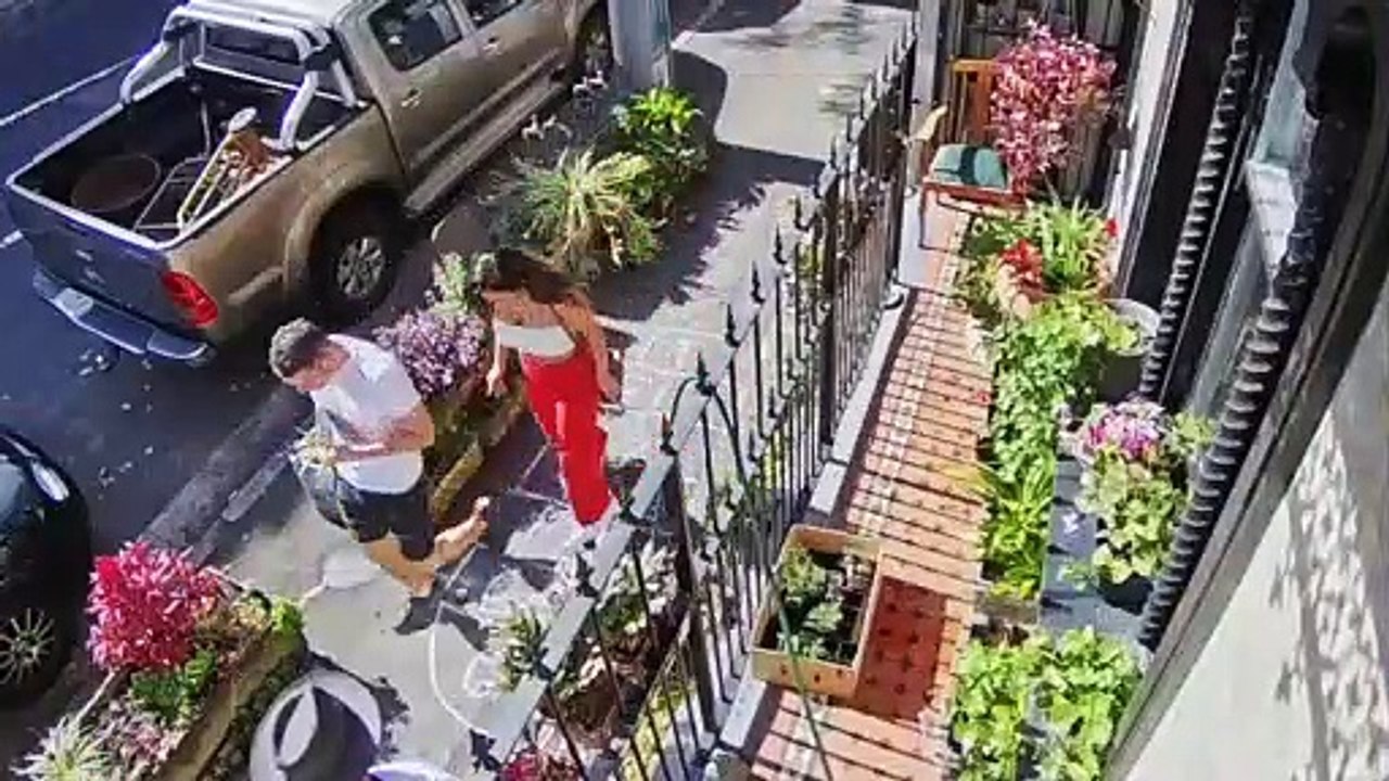 Pedestrians Play Hopscotch on Sidewalk