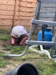 Toddler Sticks Her Head Mud Puddle
