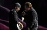 U2's Bono and The Edge perform at bomb shelter in Kyiv