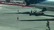 Dog Escapes From Baggage Handlers on Airport Tarmac