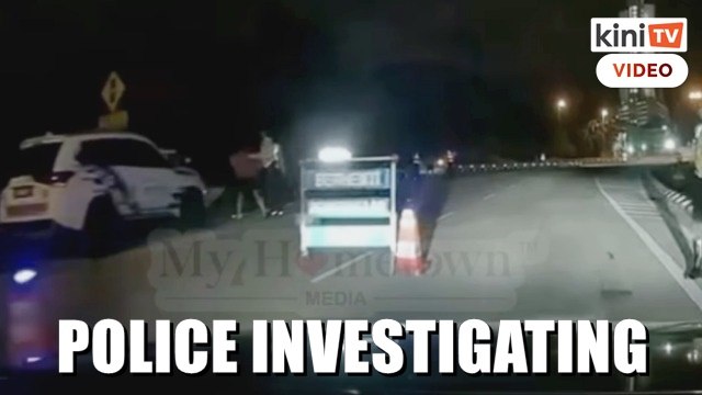 Police investigating viral video of traffic cop roughing up motorist at roadblock